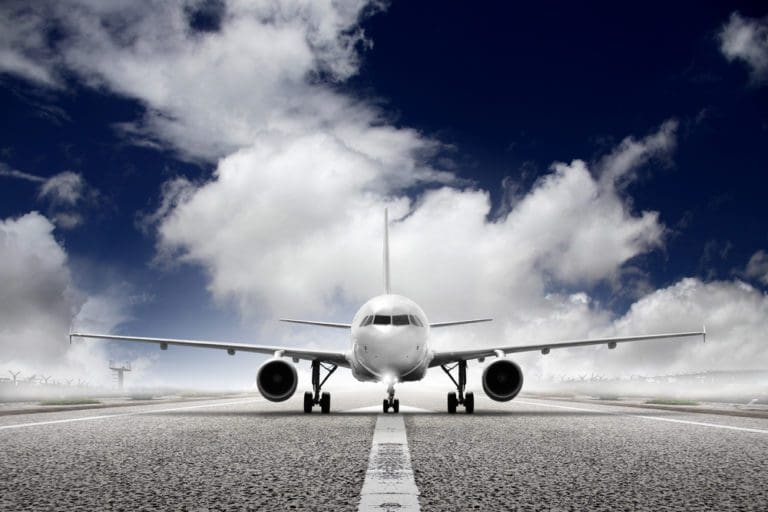 Image of plane on runaway about to take off