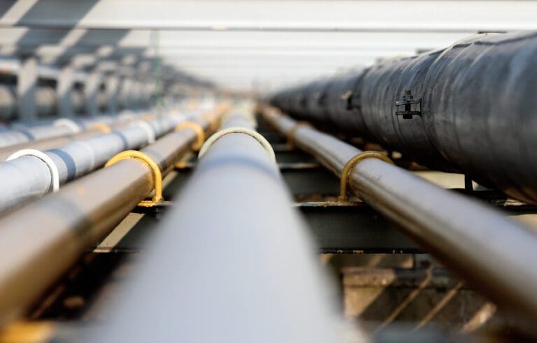 Close up of steel pipelines in a group