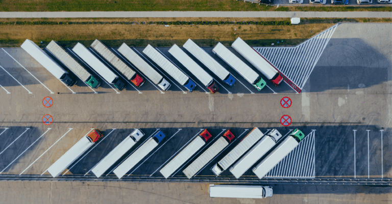 Photo of HGV's lined up in a car park