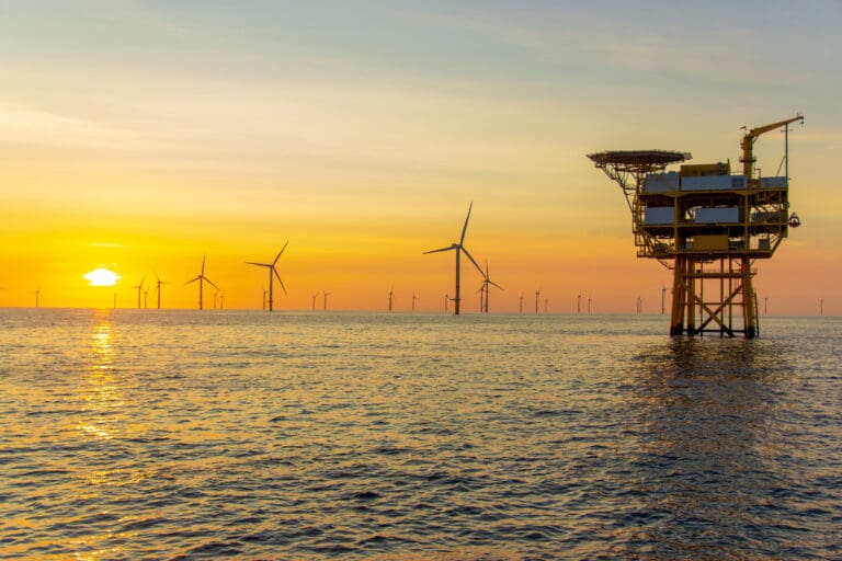 An image of a platform and wind turbines in the North Sea